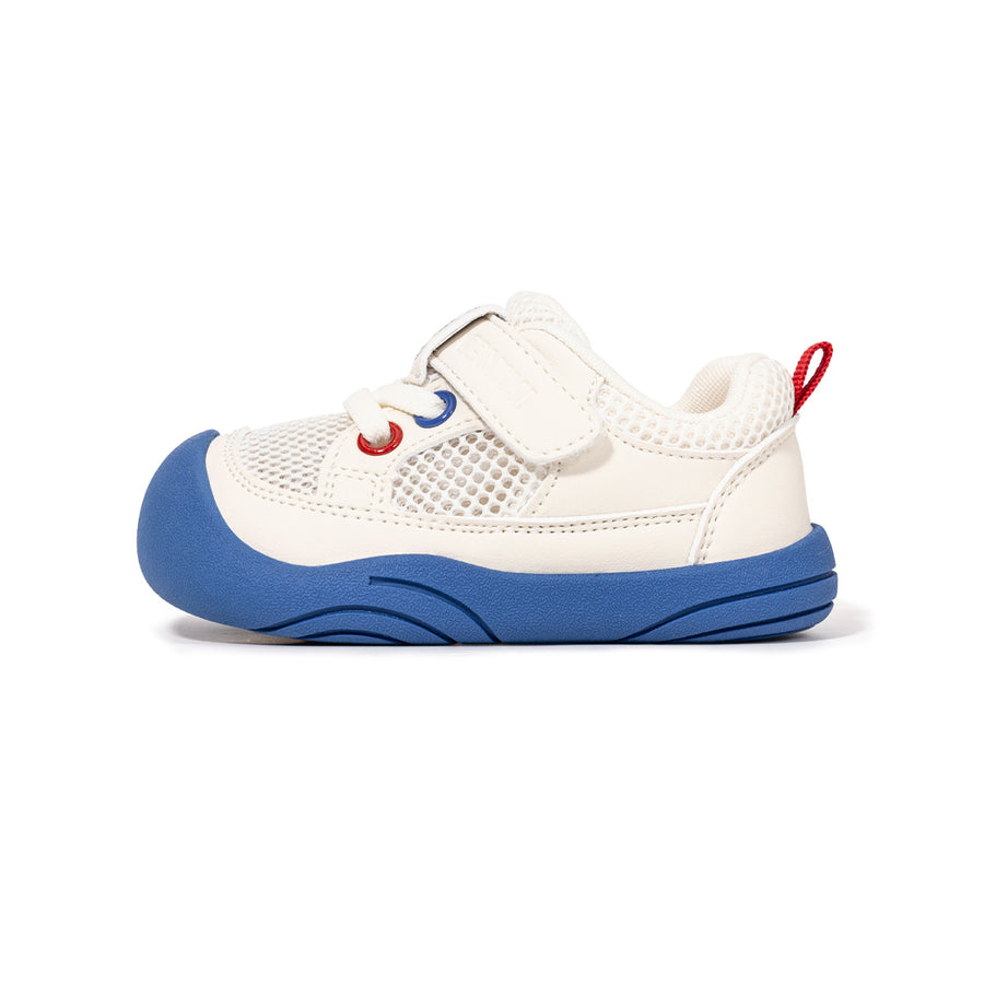 White EBMINI AERO toddler sneaker with blue outsole, side view