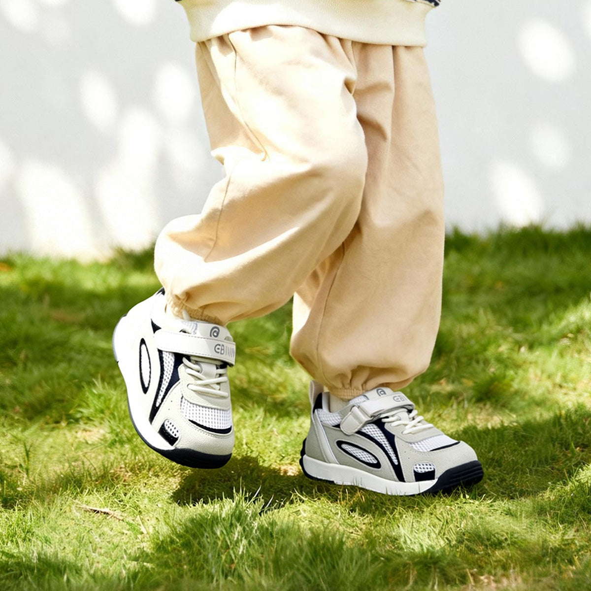 EBMINI GLIDE easy-on sneakers with a secure strap closure