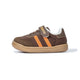 Side view of brown EBMINI GROOVE sneaker with orange double stripes
