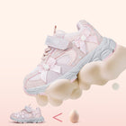 Pink EBMINI PEARL sneaker demonstrating soft flexible cushioning