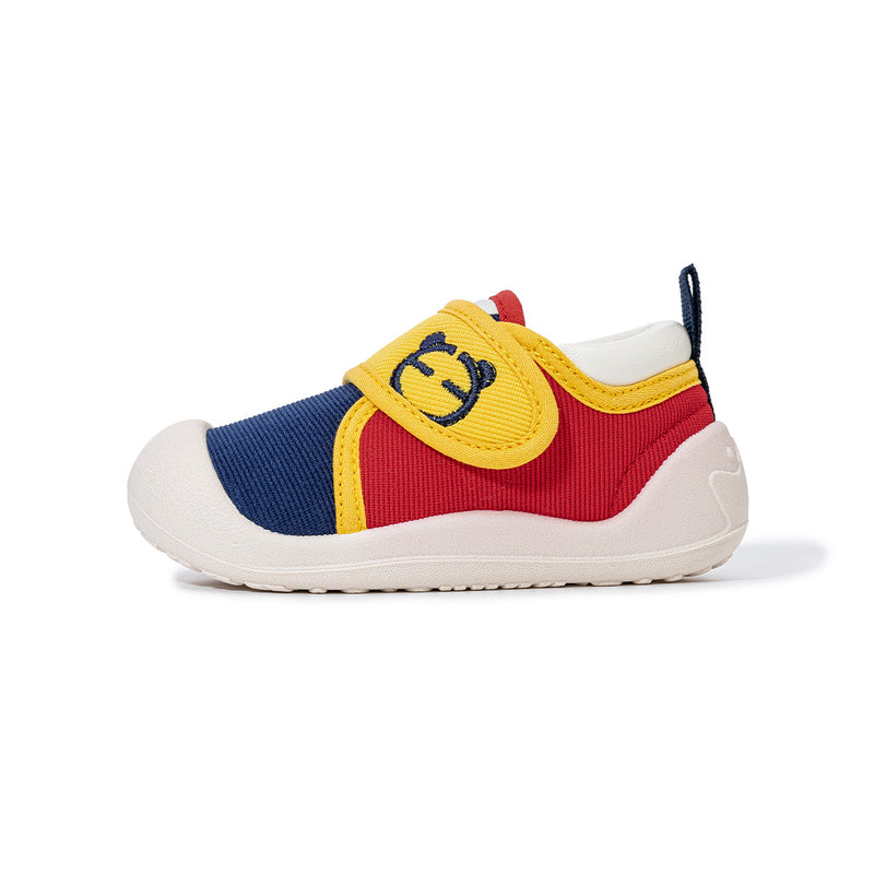 Side view of navy EBMINI PICO wide-toe toddler sneaker