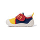 Side view of yellow EBMINI PICO color-block toddler shoe