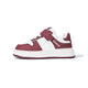 Side view of red EBMINI RACER court-style kids sneaker