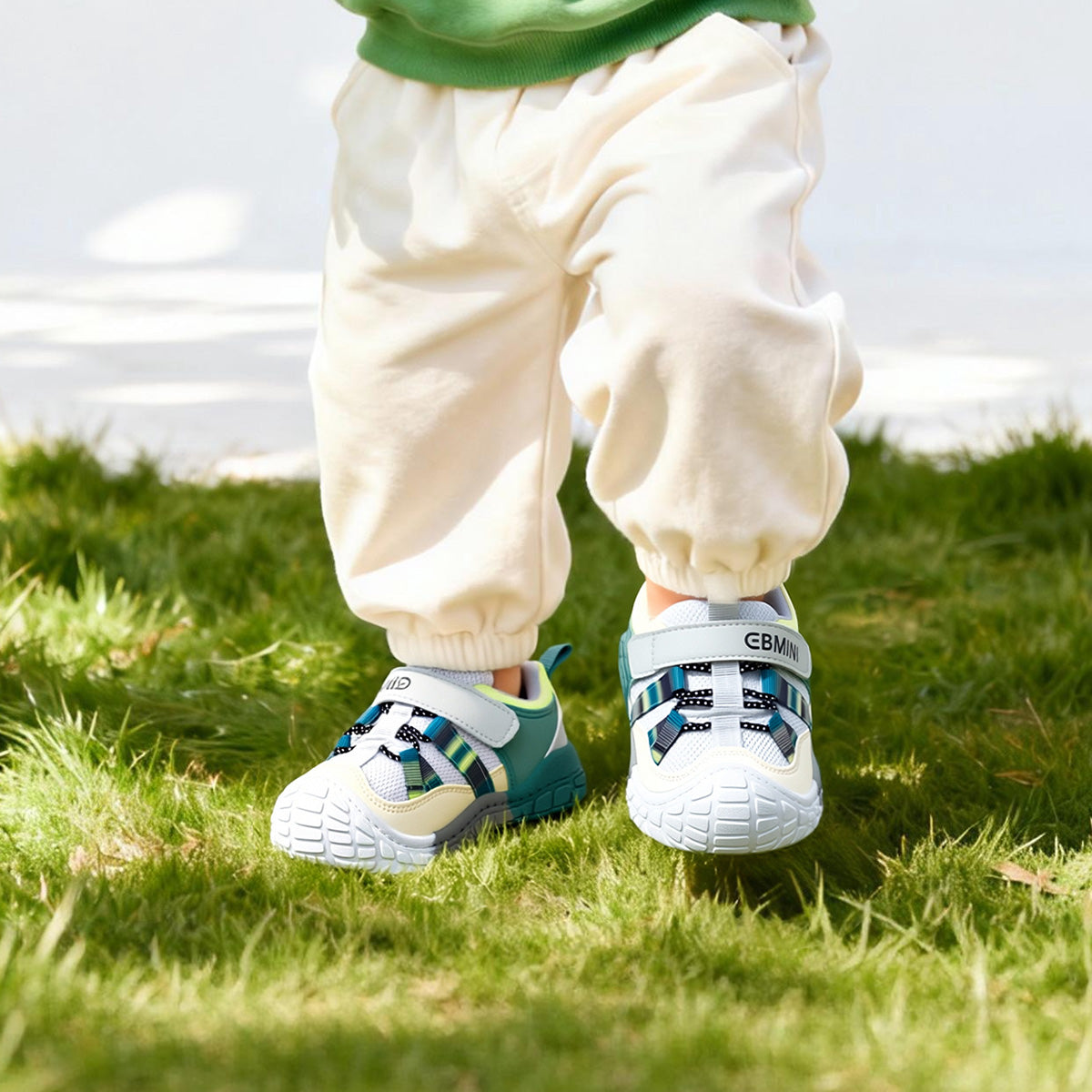 EBMINI TEAL easy-on sneakers with bungee laces and a strap closure
